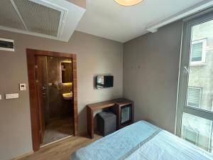 A bed or beds in a room at Reikartz 2017