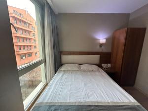 A bed or beds in a room at Reikartz 2017