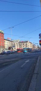 an empty city street with buildings and a traffic light at Agi in Oslo