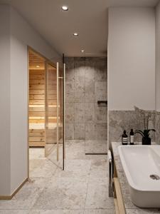 A bathroom at ADEA Lifestyle Suites Fieberbrunn