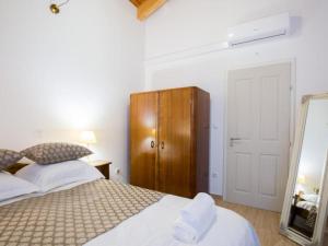 Postel nebo postele na pokoji v ubytování Stone Villa Bosnic
