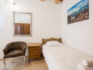 Postel nebo postele na pokoji v ubytování Stone Villa Bosnic