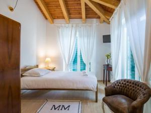 Postel nebo postele na pokoji v ubytování Stone Villa Bosnic