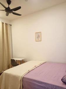 Ένα ή περισσότερα κρεβάτια σε δωμάτιο στο Stay and Sleep Bangi - 4 Bedrooms +40 φωτογραφίες