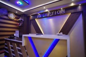 a stage with a sign that says reception at Hotel Asha Inn in Jasidih