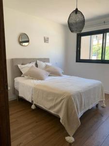 Villa moderne - Favone客房内的一张或多张床位