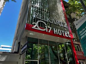 a hotel sign on the front of a building at Turk Inn 2017 Otel in Ankara