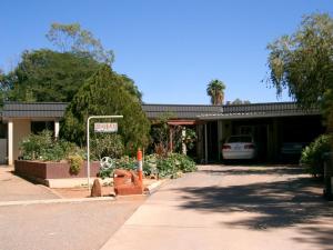 a building with a car parked in front of it at Kathys Place Bed and Breakfast in Alice Springs
