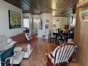 a living room with a couch and a table at Cozy apartment in quite zone in Hollywood