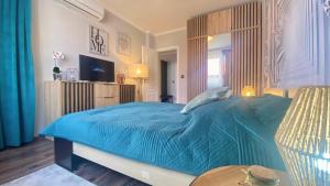 Postel nebo postele na pokoji v ubytování Villa Valencia + 37 fotografií
