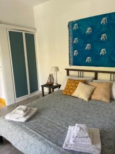 Llit o llits en una habitació de Villa Luisa B&B