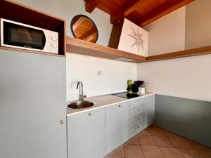Kuchyňa alebo kuchynka v ubytovaní Relais Rosa Dei Venti -Ciao Vacanze-
