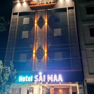 a hotel salmiya with a sign in front of it at Hotel Sai Maa in Shirdi