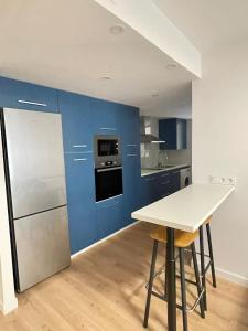 Kuchyň nebo kuchyňský kout v ubytování Gandía playa recién reformado