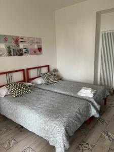 Llit o llits en una habitació de Villa Luisa B&B
