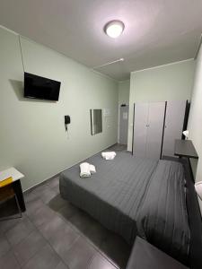 Postel nebo postele na pokoji v ubytování Hotel Austria + 35 fotografií