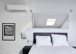Posteľ alebo postele v izbe v ubytovaní Destino Málaga Centro I