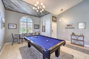 a living room with a pool table in it at Family Fun for Everyone in Las Vegas- 4 Bedrooms, Billiards, Game Room in Las Vegas