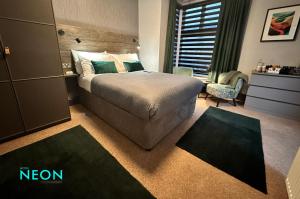 Ένα ή περισσότερα κρεβάτια σε δωμάτιο στο Hotel Neon
