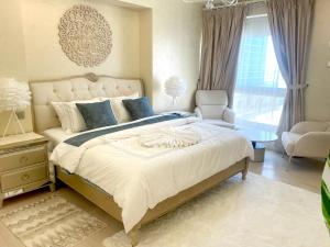 Postel nebo postele na pokoji v ubytování ROYAL BEACH RESIDENCES 2