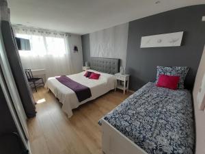 Postel nebo postele na pokoji v ubytování Chambre d'hôtes Les Bruyères