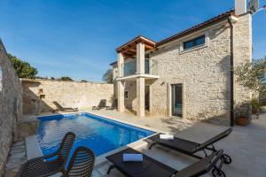 Swimmingpoolen hos eller tæt på Casa Masso