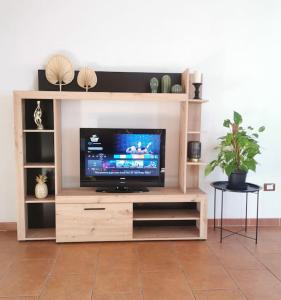 TV a/nebo společenská místnost v ubytování A casa di Franci