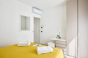 Ένα ή περισσότερα κρεβάτια σε δωμάτιο στο Una finestra al lago