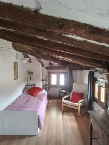 Łóżko lub łóżka w pokoju w obiekcie Casa 643km
