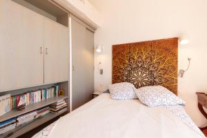 Postel nebo postele na pokoji v ubytování L'aiguade - Cassis