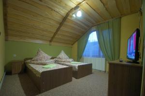 En eller flere senge i et værelse på U Slavika