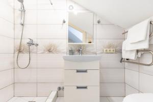 Kylpyhuone majoituspaikassa Vila Sonata Palanga