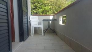 Balkón nebo terasa v ubytování b&b binario nove e tre quarti