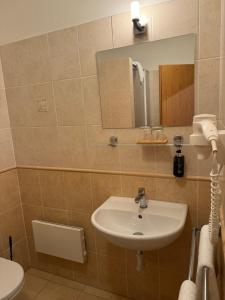 Koupelna v ubytování Apartmány KiRi