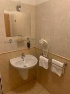 Koupelna v ubytování Apartmány KiRi