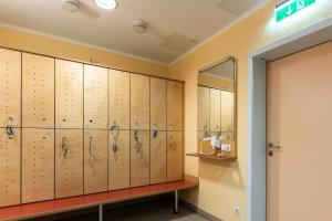 a locker room with a dressing at JUFA Hotel Hochrindl in Hochrindl