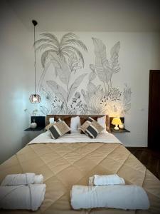 Postel nebo postele na pokoji v ubytování Umi B&B