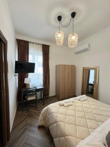 Postel nebo postele na pokoji v ubytování Umi B&B