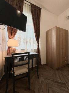 TV a/nebo společenská místnost v ubytování Umi B&B