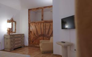 A television and/or entertainment centre at Tenute Al Bano