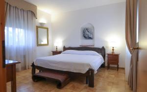 A bed or beds in a room at Tenute Al Bano