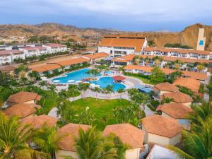 an aerial view of a resort with a swimming pool at Casa Andina Select Zorritos Tumbes in Zorritos
