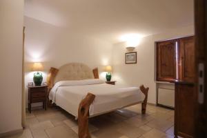 A bed or beds in a room at Tenute Al Bano