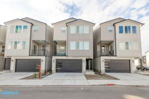 a large apartment building with three stories at Pooley Pad in American Fork