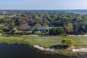 an aerial view of a golf course with a lake at Taj Duval, Sleeps 14, Pool, Lux in Jacksonville Beach