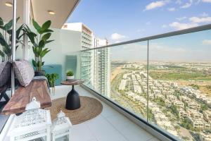 a balcony with a view of a city at Frank Porter - Carson A in Dubai Marina