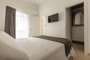 Posteľ alebo postele v izbe v ubytovaní Bastioni Luxury Home by Perle di Puglia