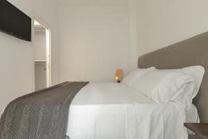 Posteľ alebo postele v izbe v ubytovaní Bastioni Luxury Home by Perle di Puglia