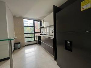 Kuchyň nebo kuchyňský kout v ubytování 402 - Beautiful Apartament In Heart Of El Poblado