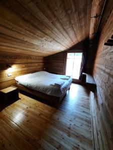 Voodi või voodid majutusasutuse Chalet du Paradis toas